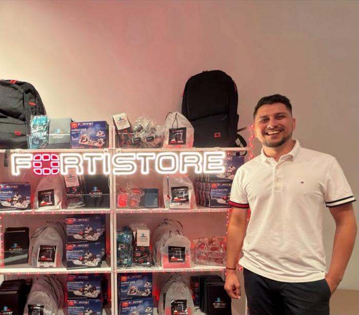 The FortiStore prize shelves stocked with backpacks and LEGO sets.